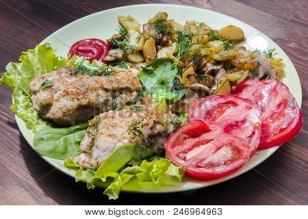 Fried Chicken With Potatoes, Mushrooms And Chicken