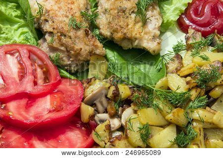 Fried Chicken With Potatoes, Mushrooms And Chicken