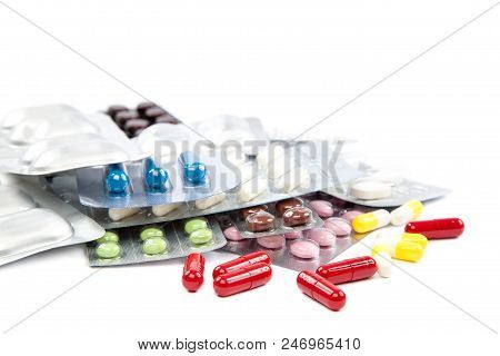 Pills In Blister Packs Isolated On White Background.