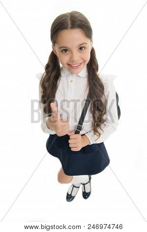 Highly Recommend. Schoolgirl Shows Thumb Up Gesture, Isolated White Background. Girl Happy Smiling R