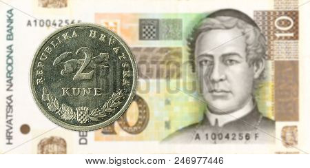 2 Croatian Kuna Coin Against 10 Croatian Kuna Bank Note
