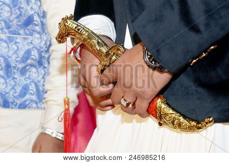 Indian Groom Hold A Traditional Knife In Wedding