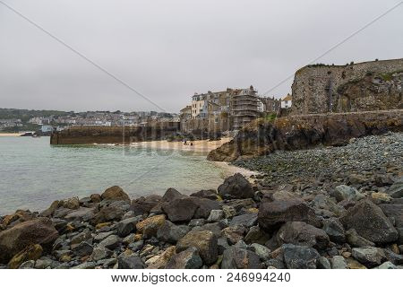 St. Ives, Cornwall, Uk - 02 May, 2014: Cloudy Day At St Ives Harbor. Town Lies Of The Celtic Sea.