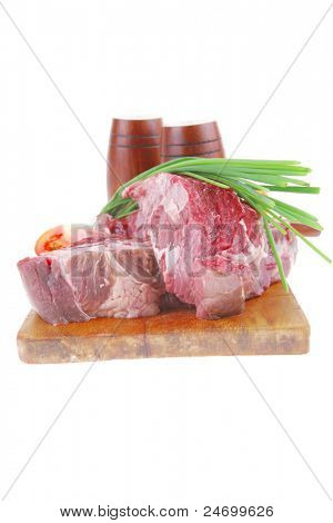 savory : bloody beef raw steak on wood cut board ready to cooking