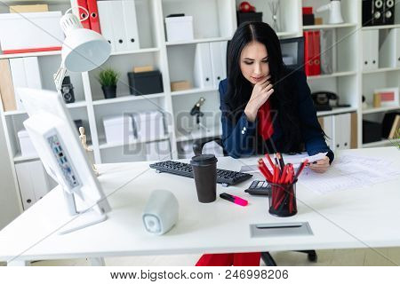 Portrait Of A Young Girl In A Suit. Beautiful Girl Is Working In The Office.