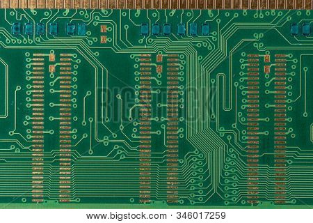 Green Microcircuit Of Old Computer Random Access Memory From Top Side, Top View, Macro Photo