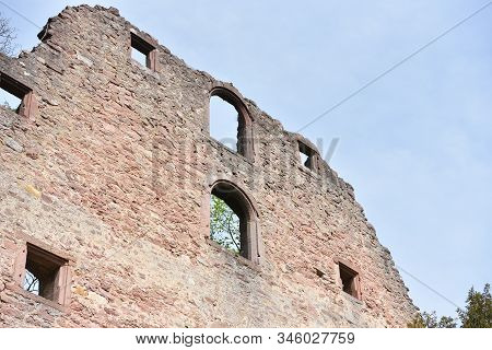 Stone Wall Ruins Of An Old Castle Of Schloss Neuenburg In Germany, Against A Blue Sky With Text Spac