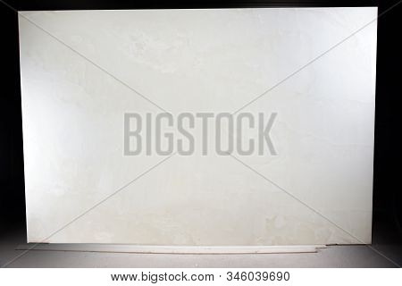 A Large Slab Of Natural White Stone Is Called Onix Bianco