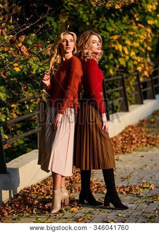 Colorful Fall Forest. Real Femininity. Autumn Women Outdoor. Girl Friends Walk In Park. Sunny Day Wi