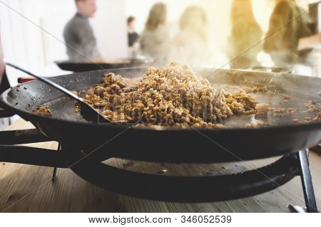 Paella Pan With Traditional Spanish Food Usually Prepared With Rice, Meat, Seafood