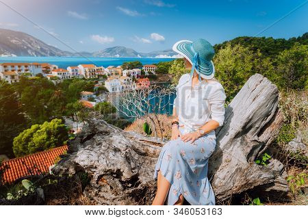 Woman Tourist On Summer Vacation On Kefalonia Island Admiring Picturesque Mediterranean Panorama Fro