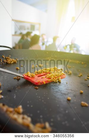 Empty Paella Pan With Traditional Spanish Food Usually Prepared With Rice, Meat, Seafood. Vertical O