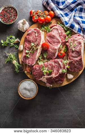 Beef Ribe Eye Steaks With Rosemary Oregano And Tomatoes.
