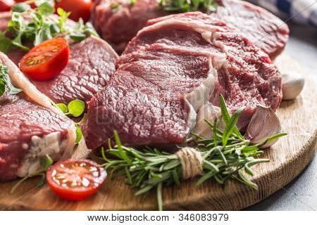 Beef Ribe Eye Steaks With Rosemary Oregano And Tomatoes