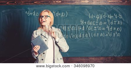 Teacher Smart Woman With Book Explain Topic Near Chalkboard. What Makes Great Teacher. School Teache