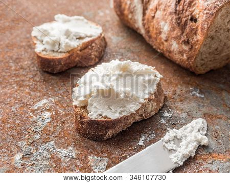 Whole Grain Bread Bruschetta With White Soft Curd Cream Cheese On A Ginger Grunge Background. Close-