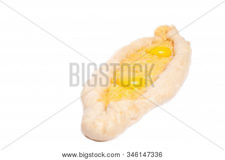 Khachapuri Boat With Egg And Cheese On White Background. National Georgian Pie Khachapuri Isolated .