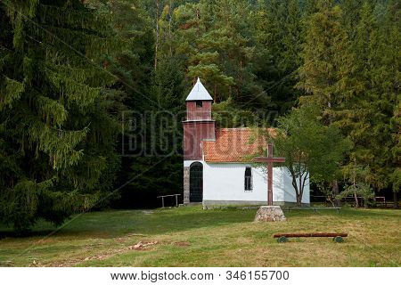 Chapel Of St. Anne Located In The Volcanic Crater, Near The Lake St. Anne In The Forest, Romania. Au