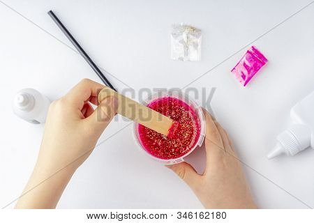 Step By Step Photo Instruction: How To Make Slime At Home. The Concept Of Diy.  Ingridients For Maki