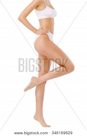 Slim Womans Legs Isolated On White Background