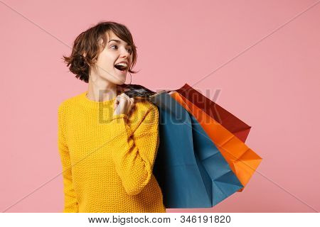 Funny Young Brunette Woman Girl In Yellow Sweater Posing Isolated On Pink Wall Background. People Li