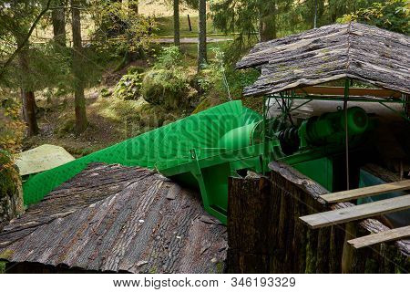 Screw Lifting Device For Pumping Water From A River Or Stream. Water Pumping System, Old Engineering