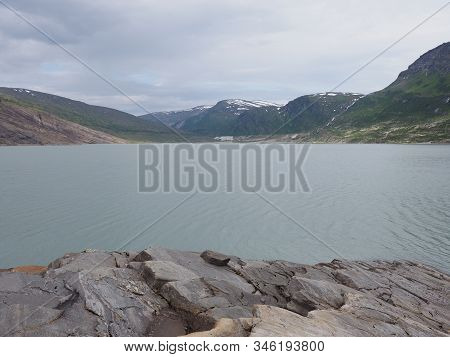 Austerdalsvatnet Lake Landscapes Near European Svartisen Glacier In Nordland County In Norway, Cloud
