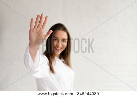 Young Beautiful Girl Pulls The Lodon To The Camera, Give Five, Photo On A White Background