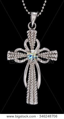 Decorative Cross With Gemstone Isolated On Black Background