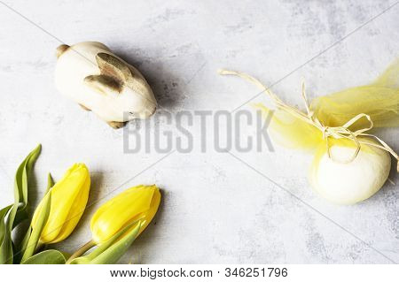 Easter Bunny With Yelow Tulips And Deco Egg