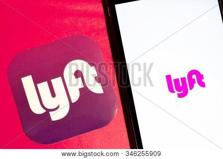 Los Angeles, California, Usa - 22 January 2020: Lyft App Logo And Phone With Icon Close Up On Red Ba