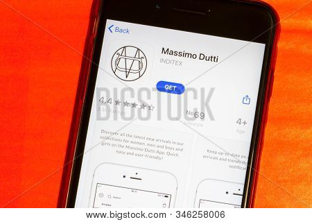 Los Angeles, California, Usa - 22 January 2020: Massimo Dutti Logo On Phone Screen Flat Lay With Red