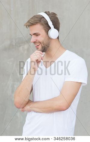Audio Fun. Happy Guy Listen To Audio In Headphones. Handsome Man Enjoy Audio Learning. Audio Course.