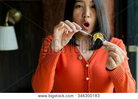 Woman Using Braces Teeth Or Silicone Trainer,orthodontic,dental Health Concept