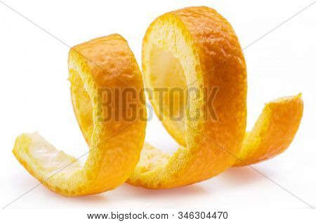 Orange peel or orange twist on white background. Close-up.