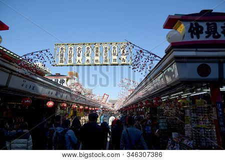 Many Travelers At The Entrance Of Sensoji Temple