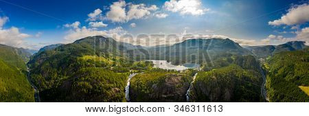 Beautiful Nature Norway natural landscape. Panorama Latefossen Waterfall Odda Norway. Latefoss is a powerful, twin waterfall.