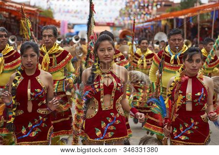 Oruro, Bolivia - February 26, 2017: Tobas Dancers In Colourful Costumes Performing At The Annual Oru