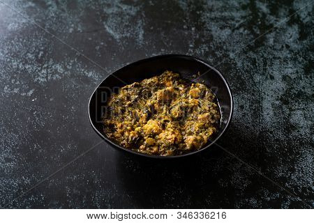 Indian Dish Spinach Lamb Palak With Chappati Flat Bread.