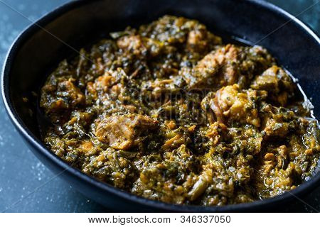 Indian Dish Spinach Lamb Palak With Chappati Flat Bread. Traditional Dish.