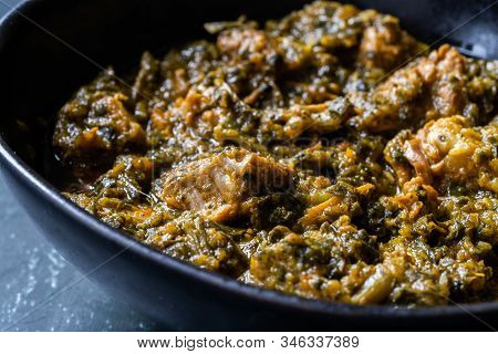 Indian Dish Spinach Lamb Palak With Chappati Flat Bread.