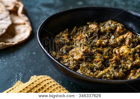 Indian Dish Spinach Lamb Palak With Chappati Flat Bread.