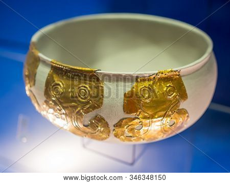 Azov, Russia - July 27, 2019: A Bowl With Gold Lining In The Form Of The Head Of A Griffin, The Expo