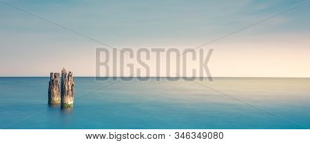 Wooden Breakwater On A Beach In Ustka, Poland, Baltic Sea