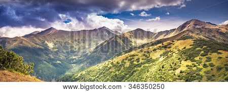 Panorama Of Tatra Mountains Under Stormy Clouds With Some Impressive Peaks: Wolowiec, Lopata, Starob