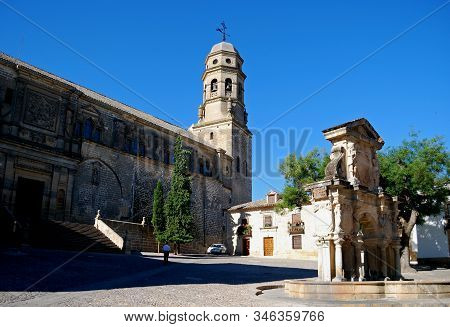 Baeza, Spain - July 28, 2008 - View Of The Cathedral With The Santa Maria Fountain To The Right In T