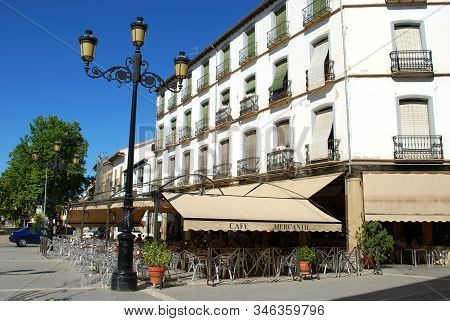 Baeza, Spain - July 28, 2008 - Pavement Cafe In The Plaza De La Constitucion With A Traditional Span
