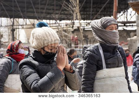 Jammu Kashmir, India - March 20 : Tibetans Walking Parade On The Road For Respect Praying Buddha Cha
