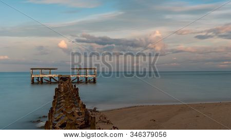 Dilapidated Old Fishing Dock Collapsing Into The Sea In Pak Nam Pran On The Gulf Of Thailand In Thai