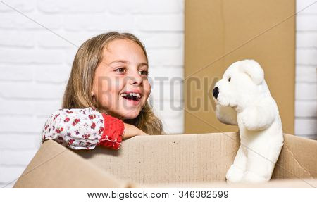 Little Child Open Post Package With Toys. Deliver Your Treasures. Storage For Toys. Delivering Happi